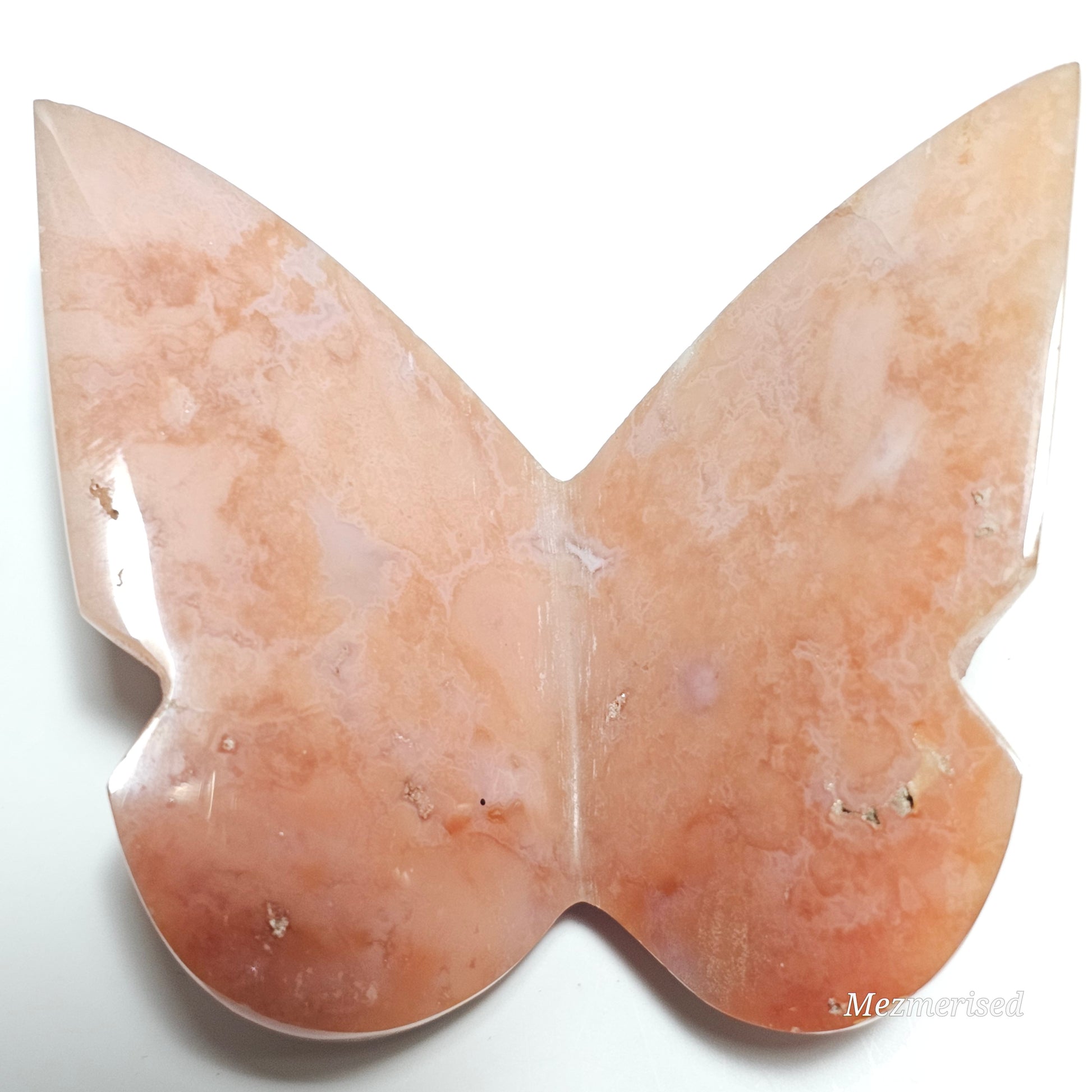 Beautiful rare pink Carnelian butterfly carving.