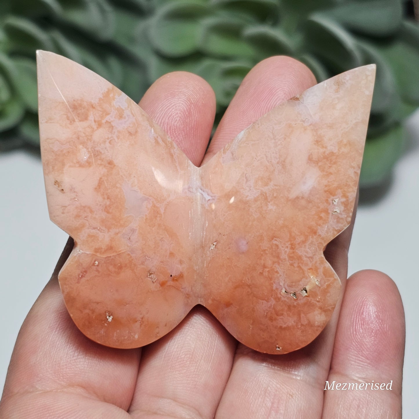 Beautiful rare pink Carnelian butterfly carving.