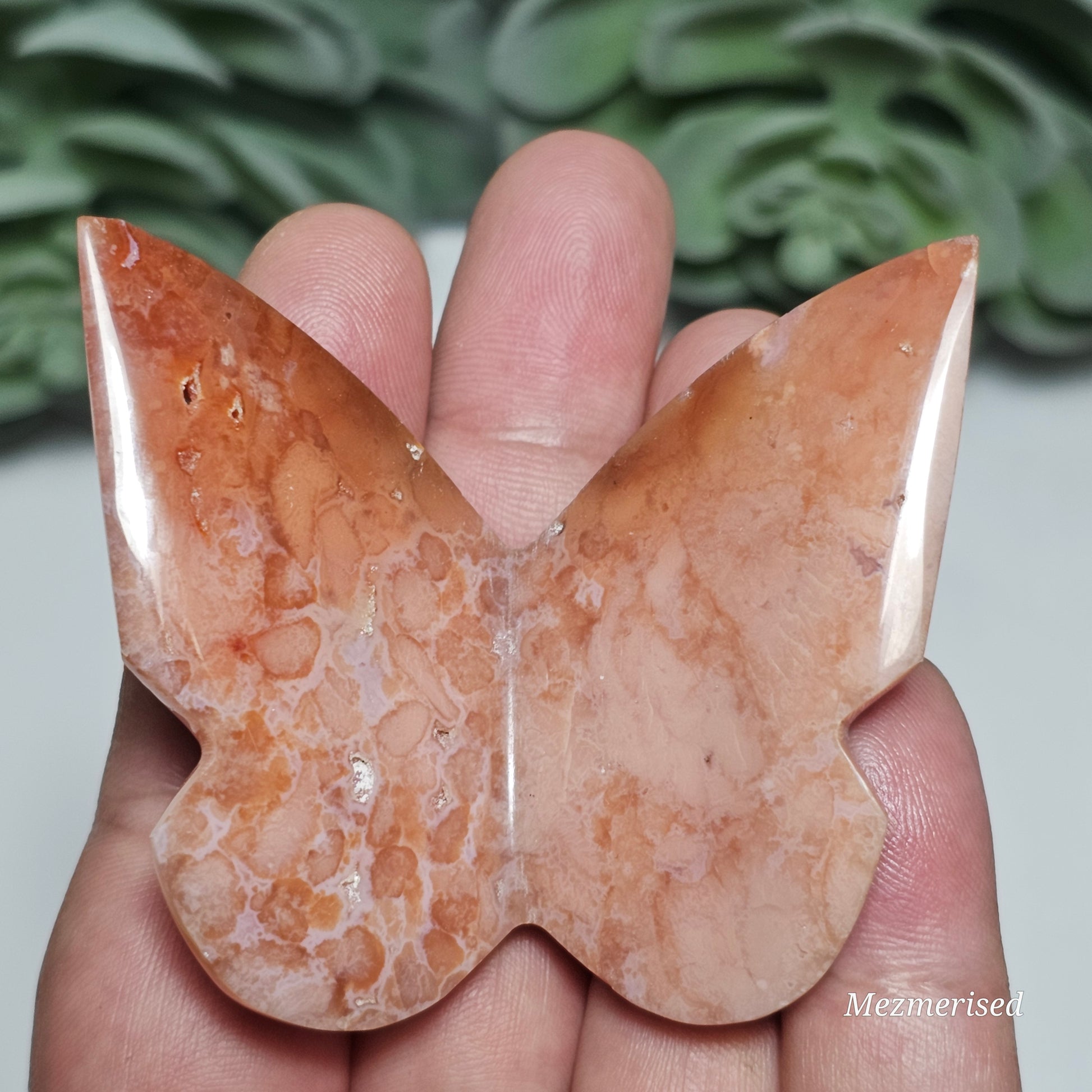 Beautiful rare pink Carnelian butterfly carving.