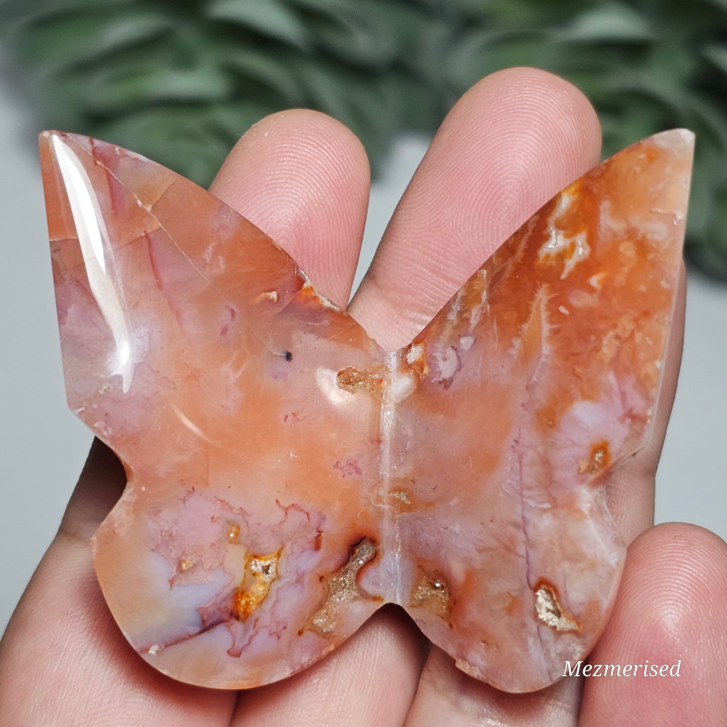 Beautiful rare pink Carnelian butterfly carving.