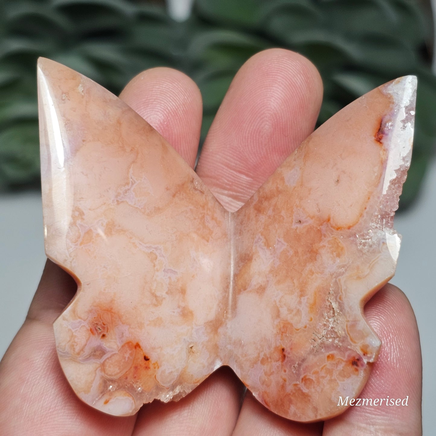 Beautiful rare pink Carnelian butterfly carving.