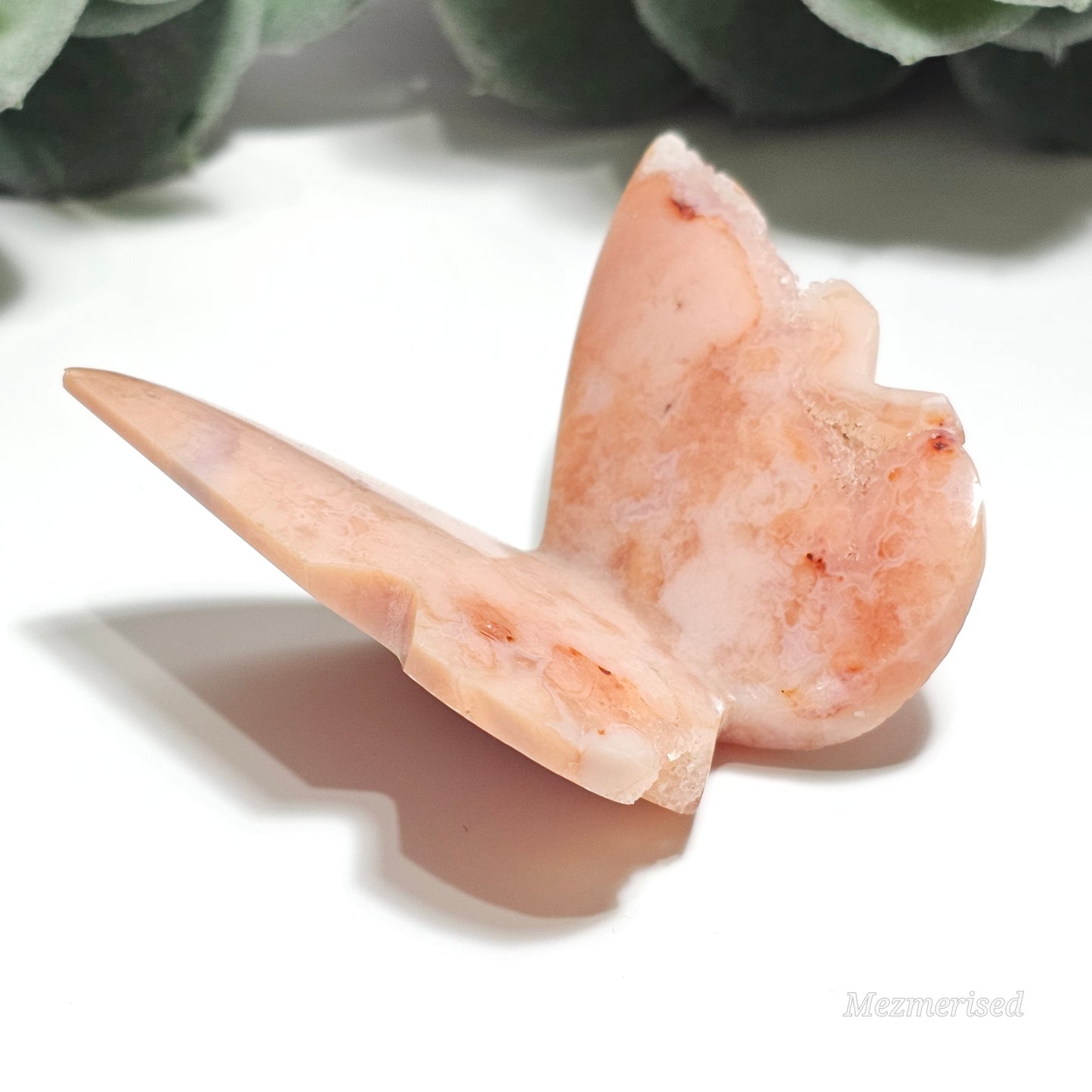 Beautiful rare pink Carnelian butterfly carving.