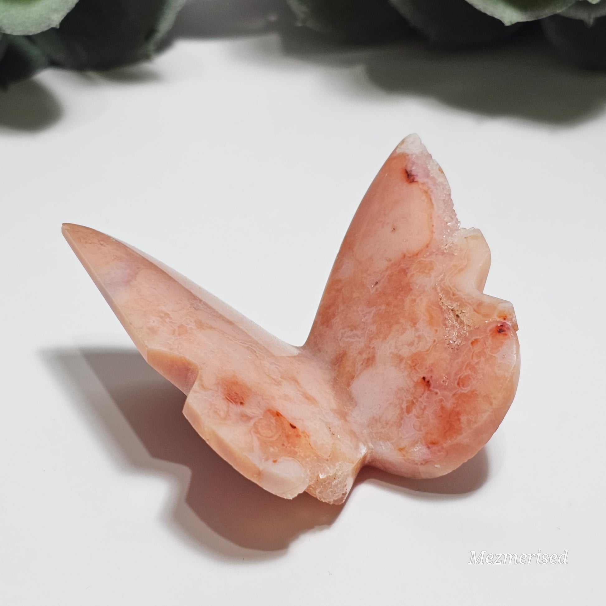 Beautiful rare pink Carnelian butterfly carving.