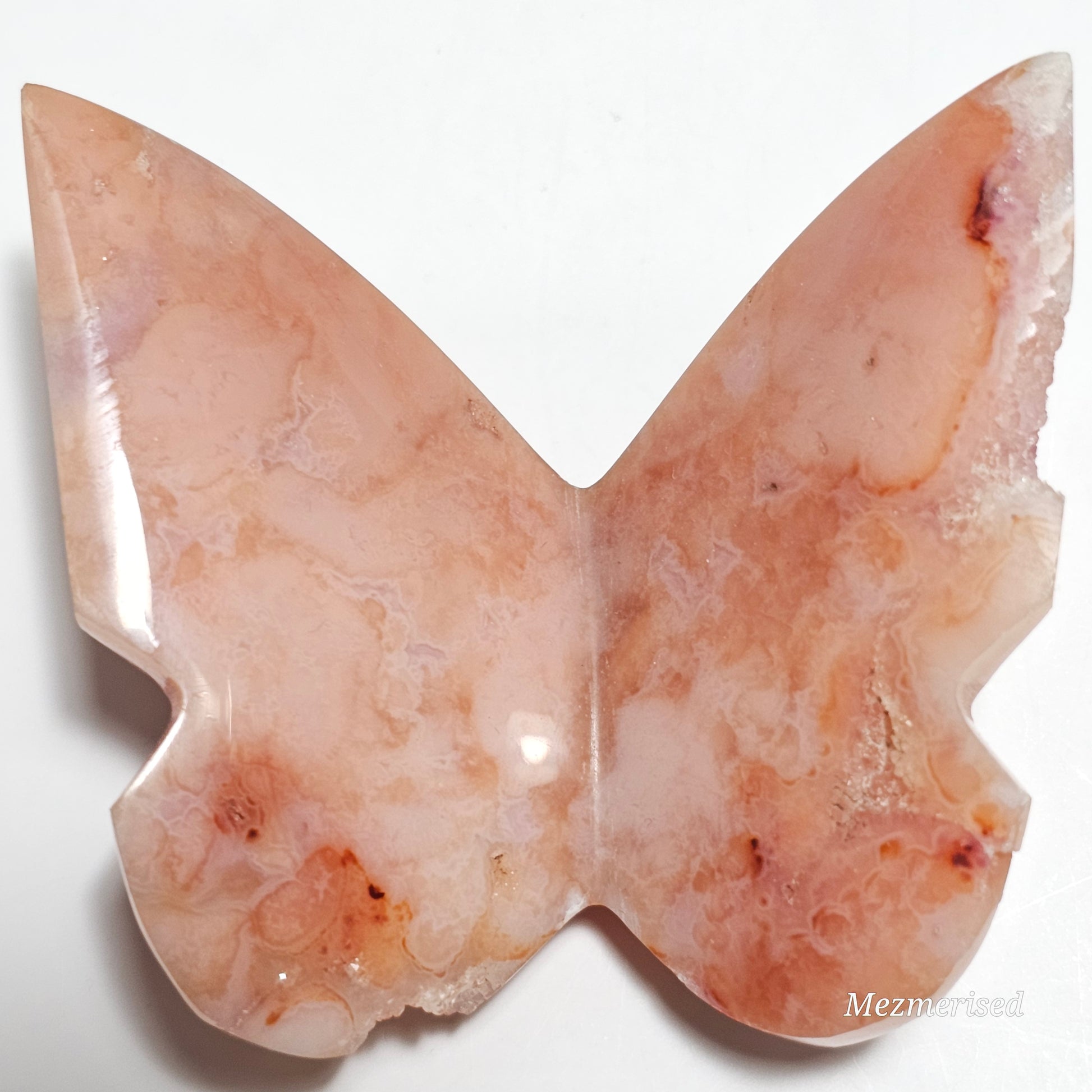 Beautiful rare pink Carnelian butterfly carving.