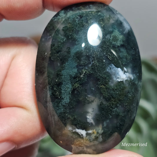 Beautiful forest green and earthy golden brown Moss Agate palm stone from Indonesia