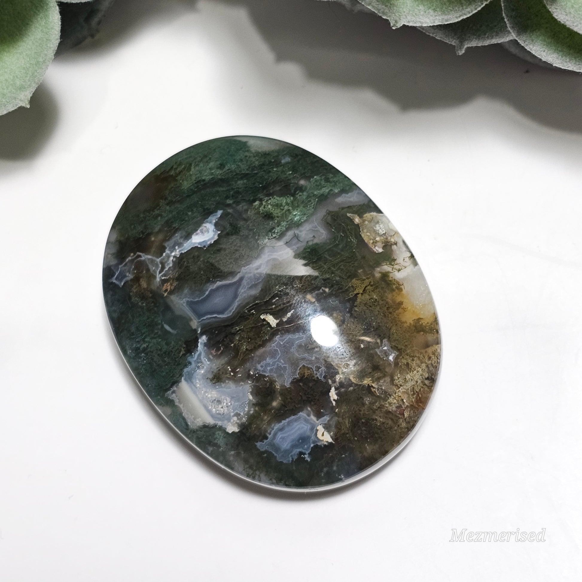 Beautiful forest green and earthy golden brown Moss Agate palm stone from Indonesia