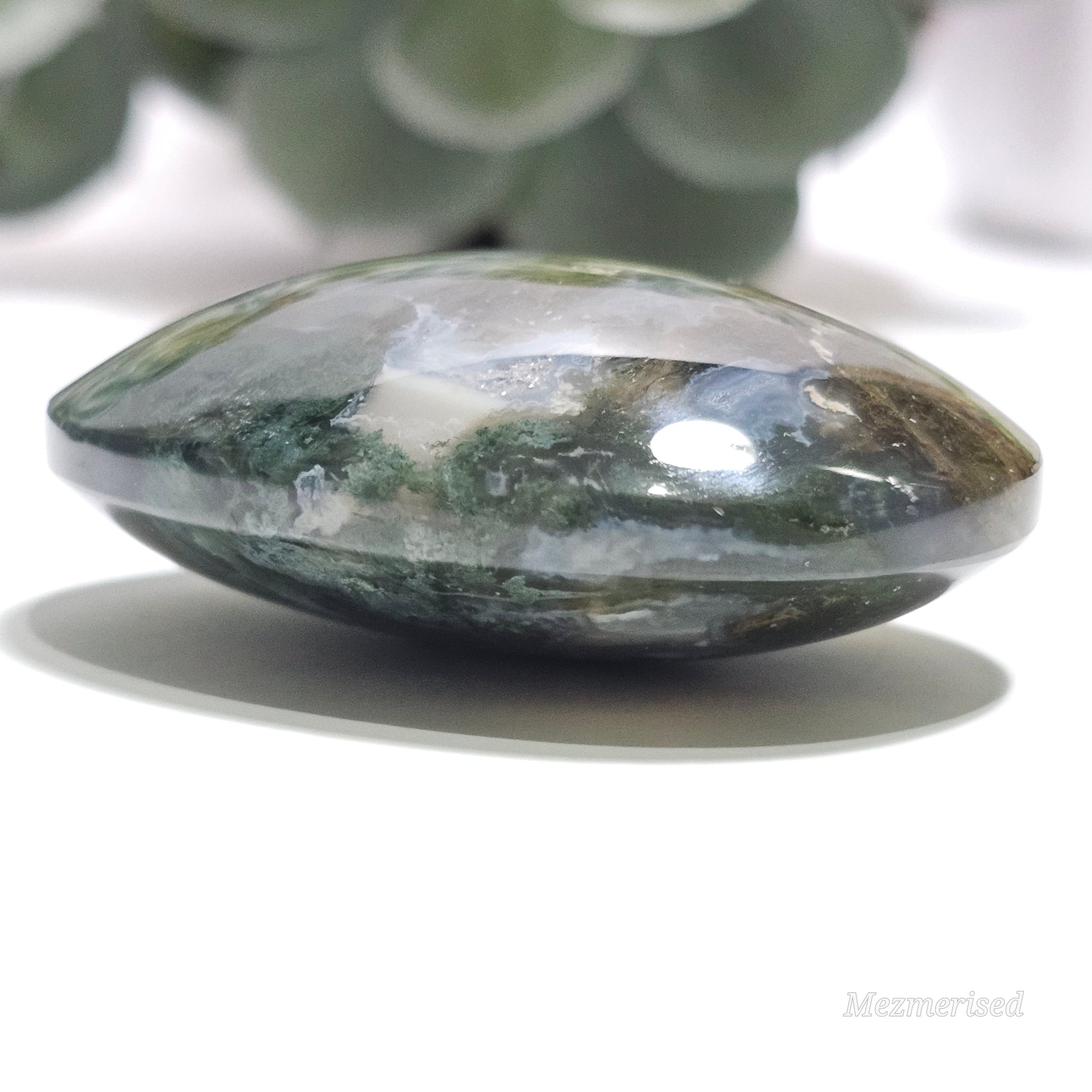 Beautiful forest green and earthy golden brown Moss Agate palm stone from Indonesia