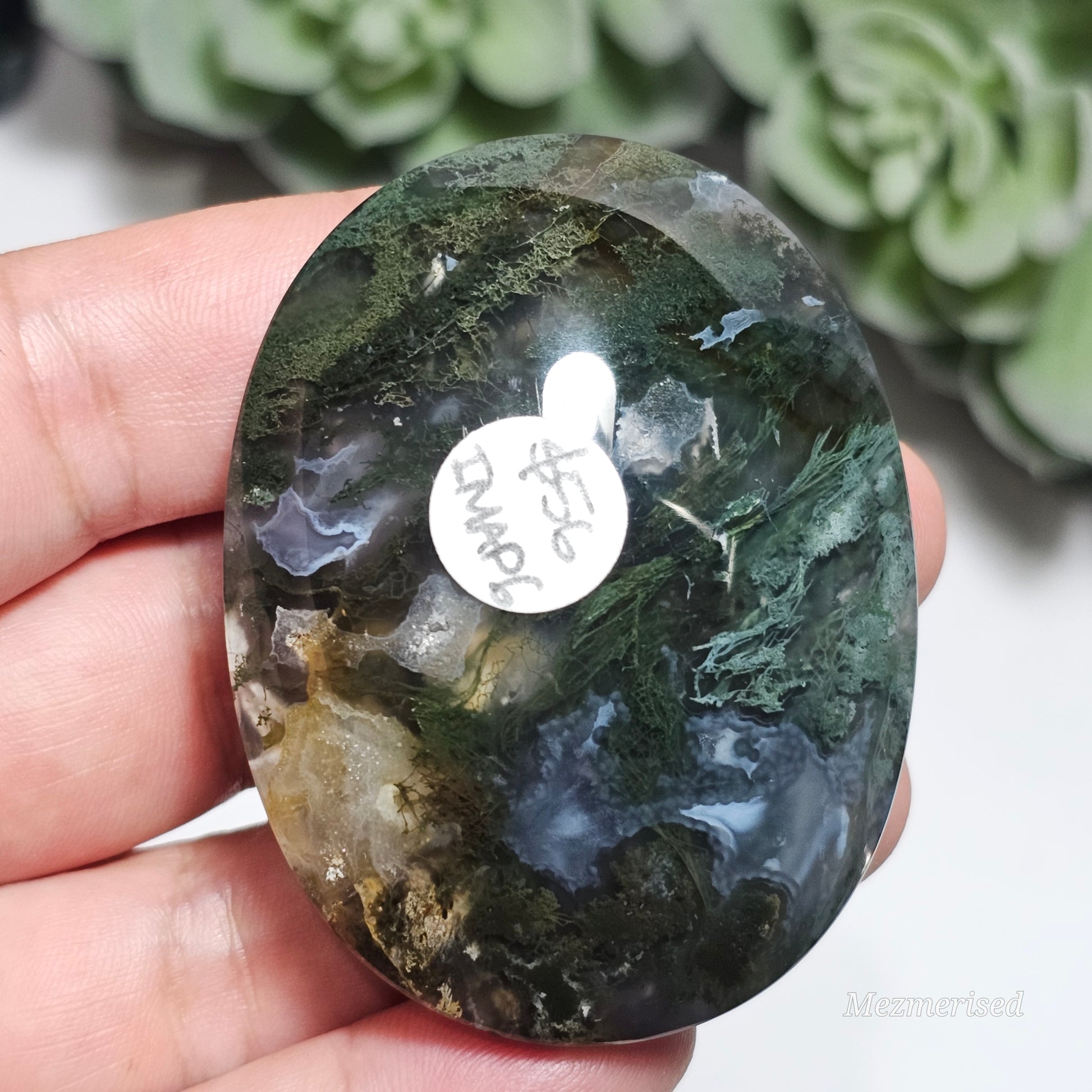 Beautiful forest green and earthy golden brown Moss Agate palm stone from Indonesia