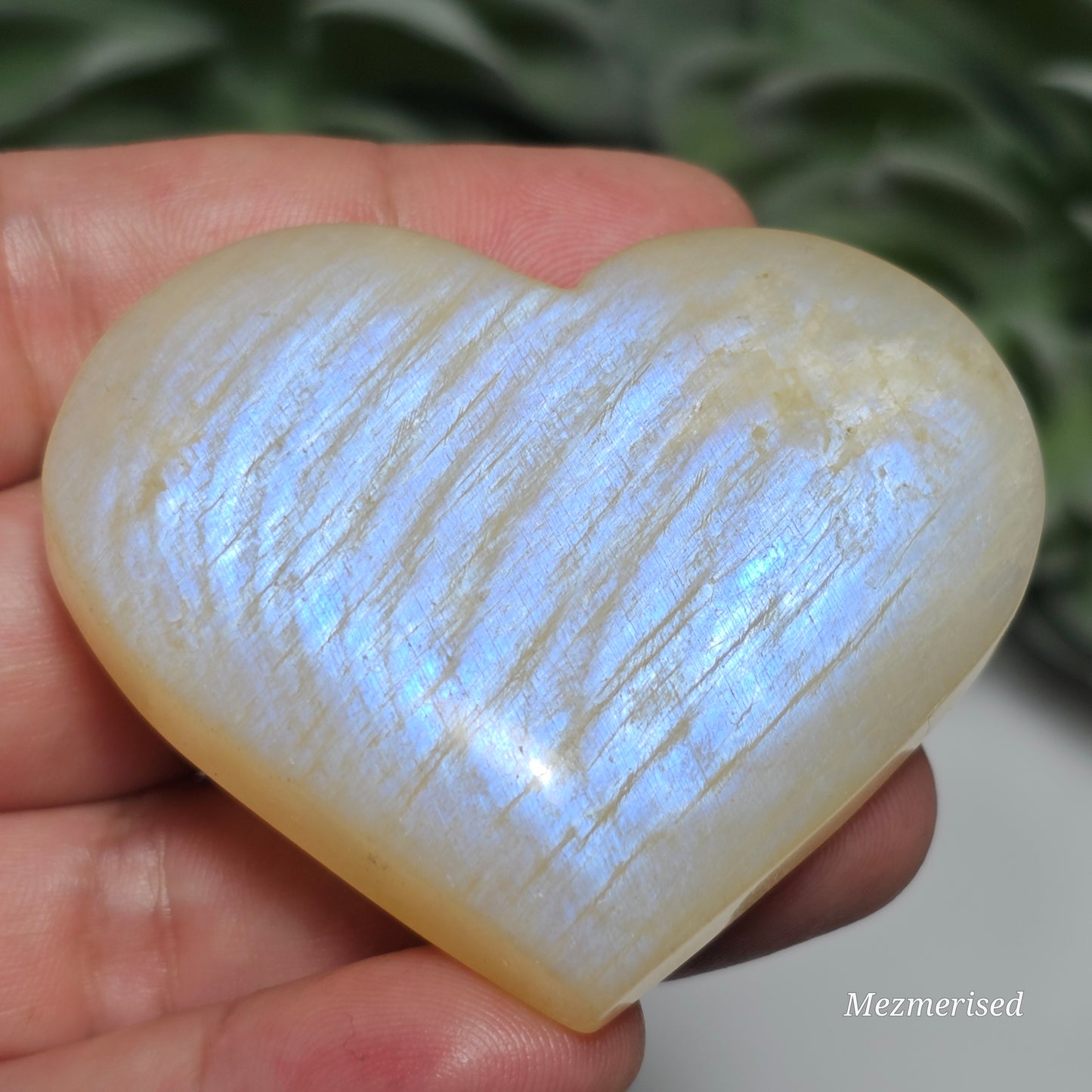 Gorgeous Rainbow Moonstone heart carving with great flash.