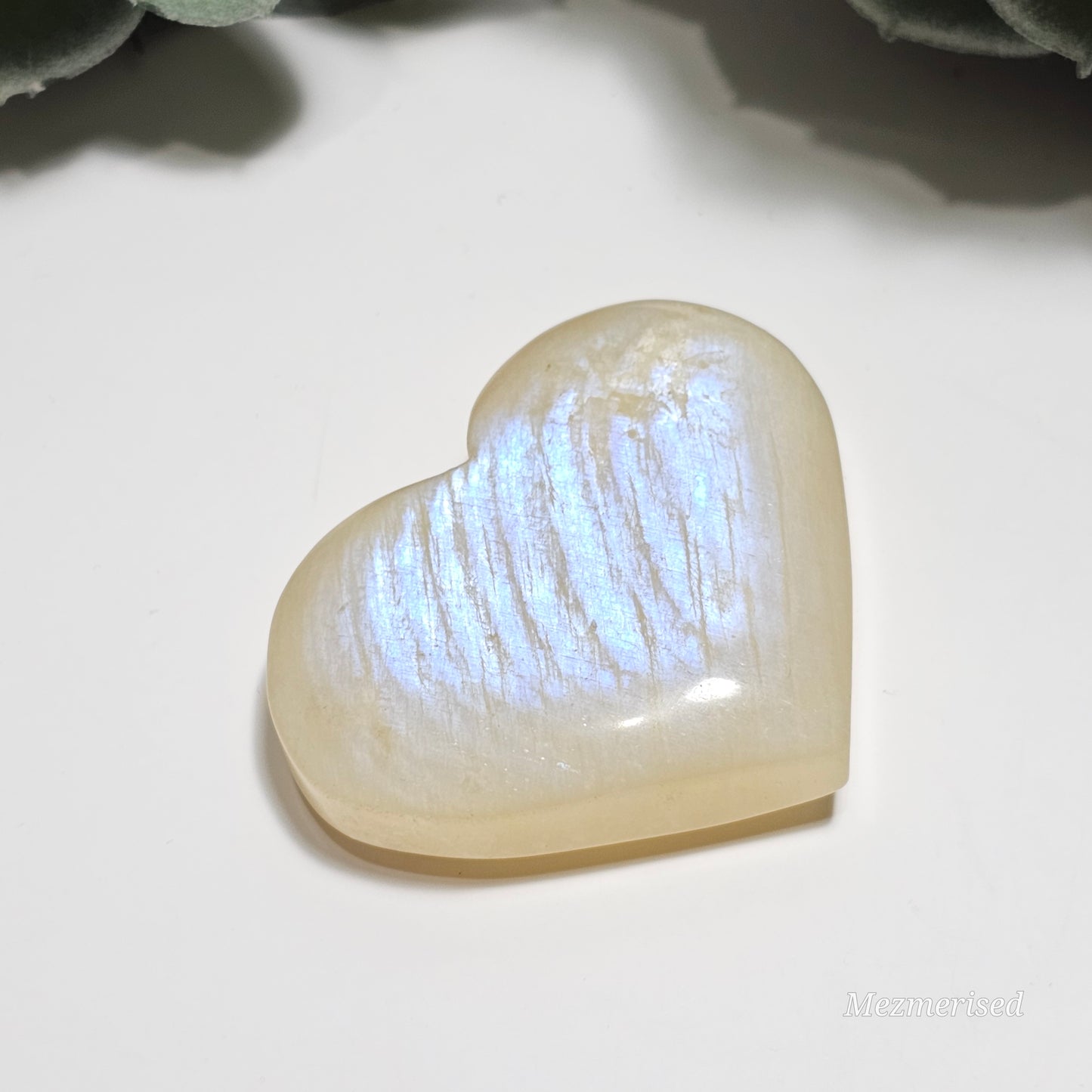 Gorgeous Rainbow Moonstone heart carving with great flash.