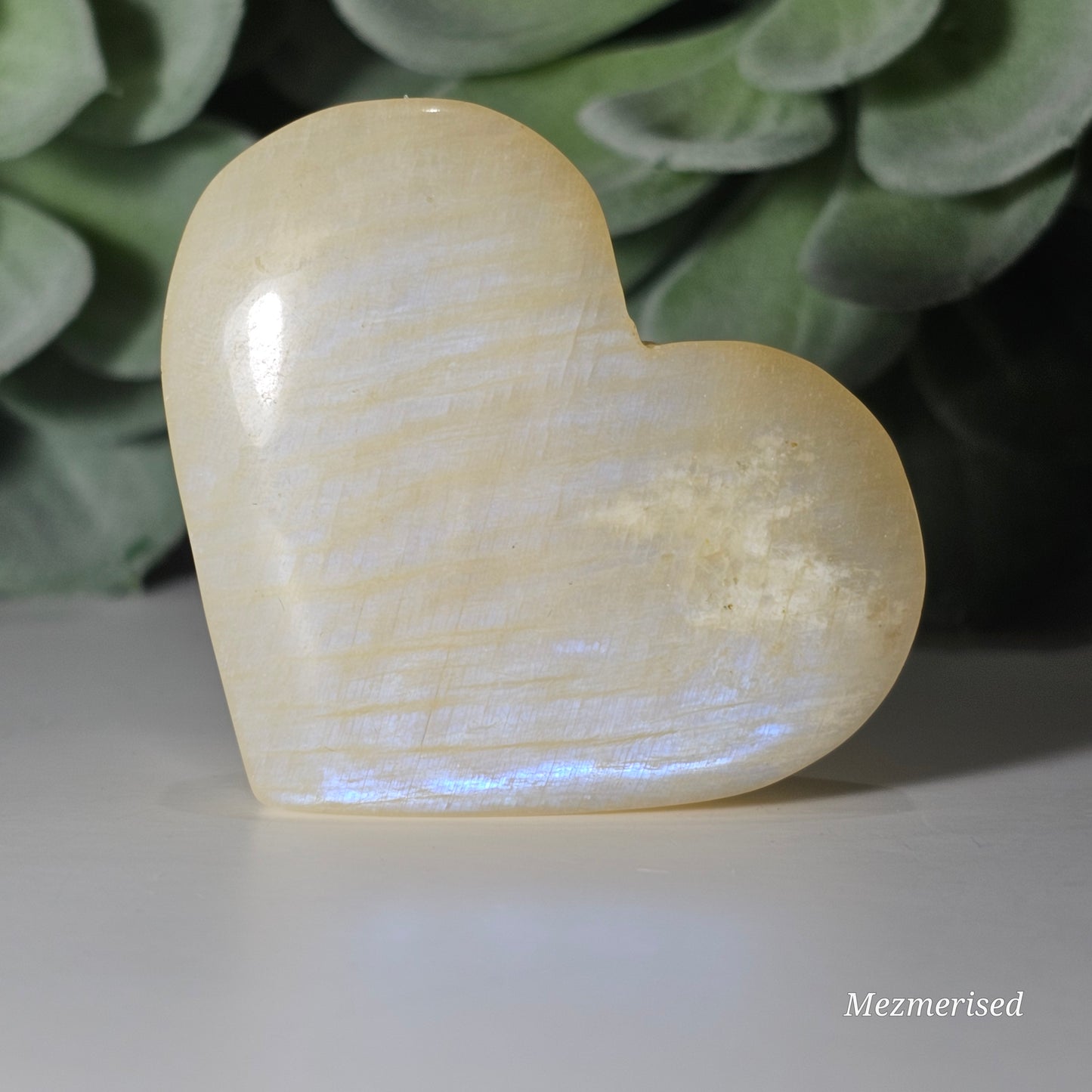 Gorgeous Rainbow Moonstone heart carving with great flash.