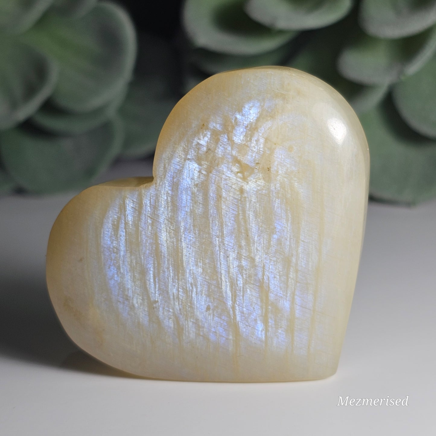 Gorgeous Rainbow Moonstone heart carving with great flash.