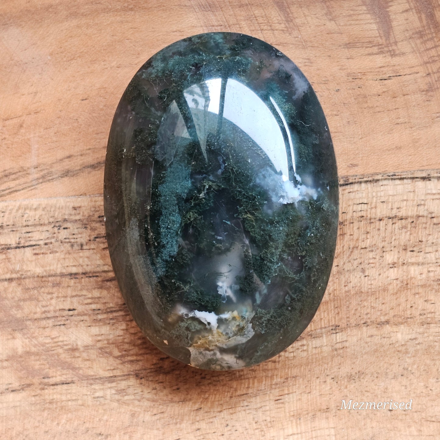 Beautiful forest green and earthy golden brown Moss Agate palm stone from Indonesia