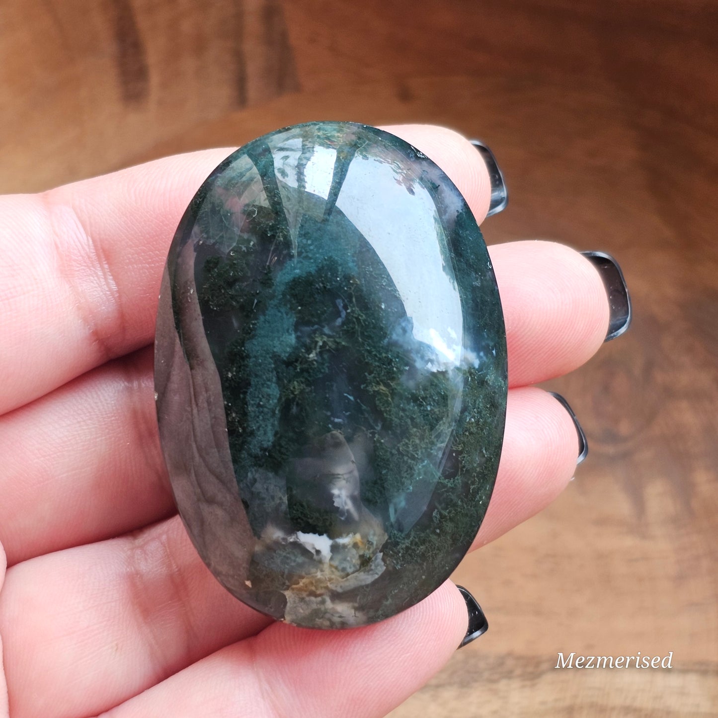 Beautiful forest green and earthy golden brown Moss Agate palm stone from Indonesia