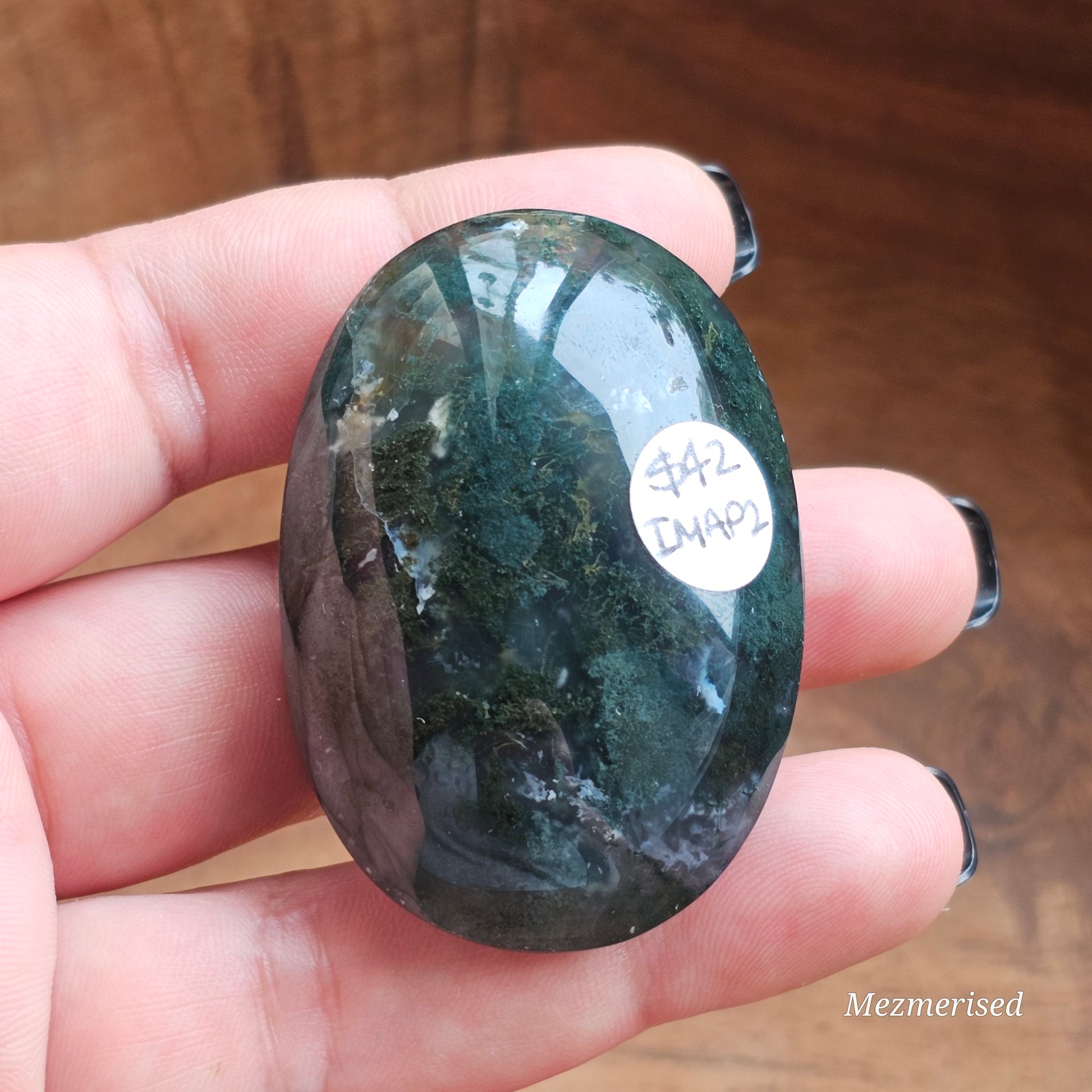 Beautiful forest green and earthy golden brown Moss Agate palm stone from Indonesia