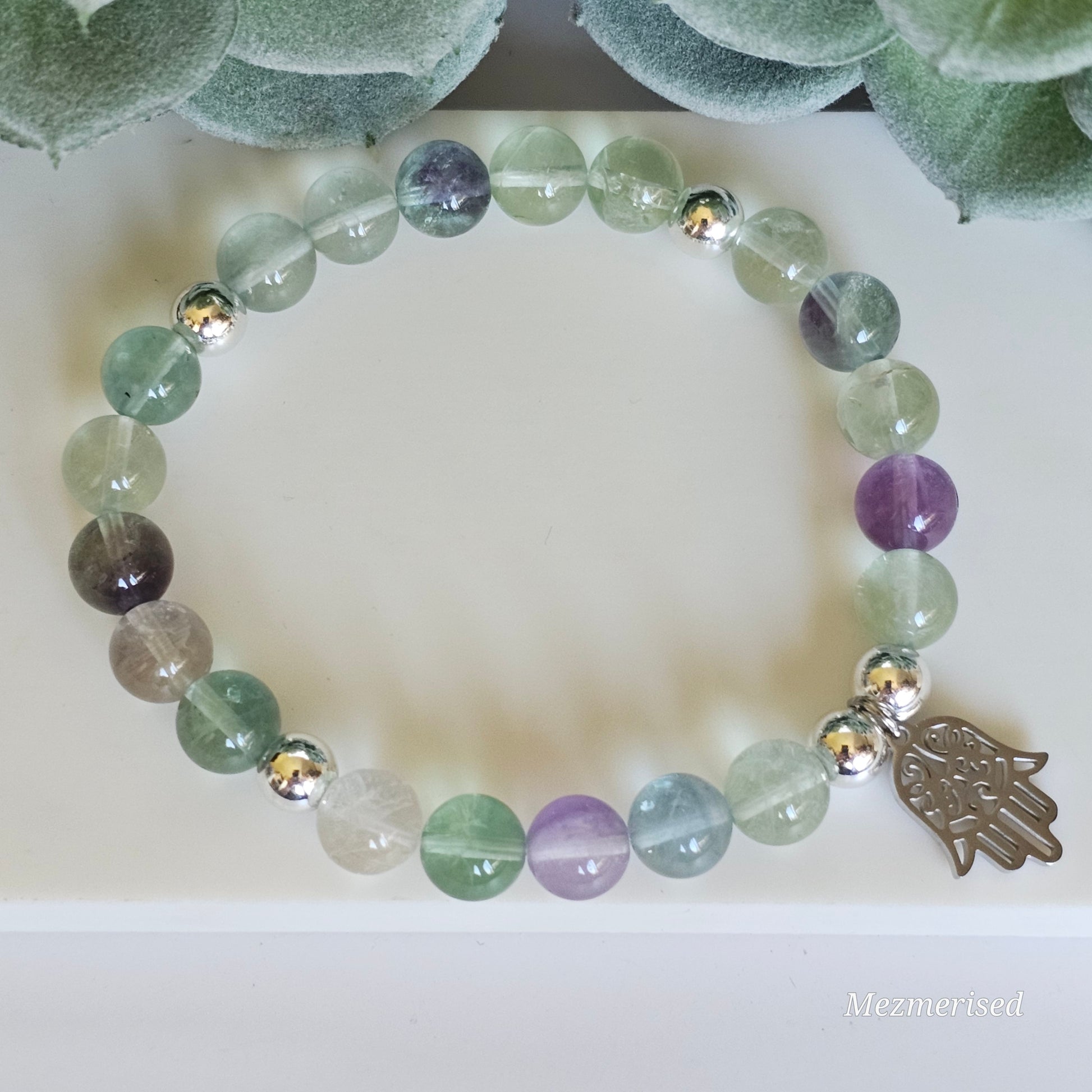 8mm A grade rainbow Fluorite and silver plated Hematite bead stretch bracelet with your choice of charm.