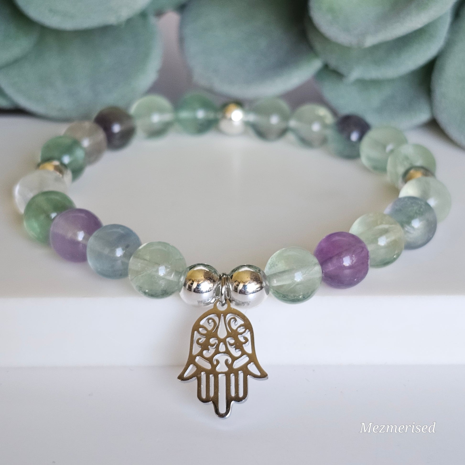 8mm A grade rainbow Fluorite and silver plated Hematite bead stretch bracelet with your choice of charm.