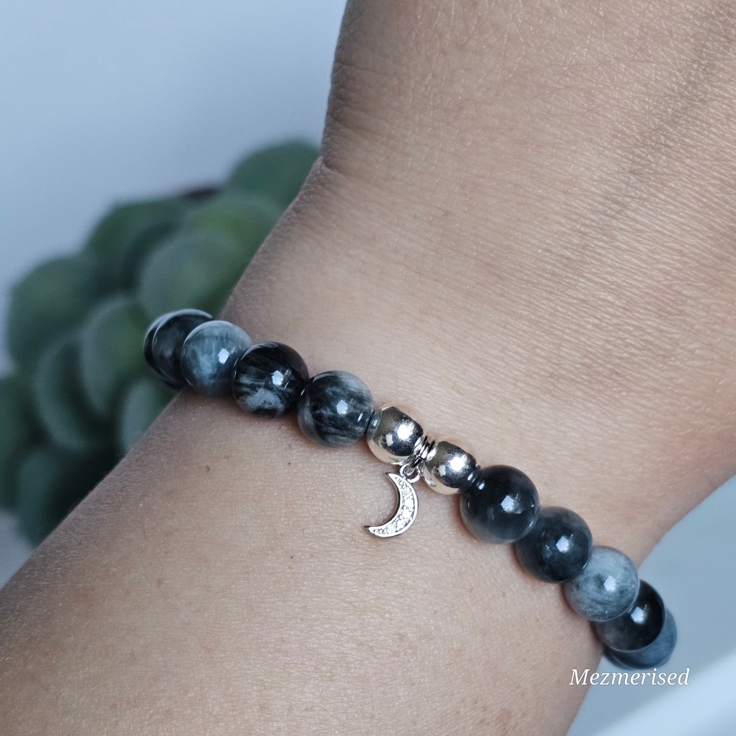 8mm Hawk's Eye and silver plated Hematite bead stretch bracelet with your choice of charm.