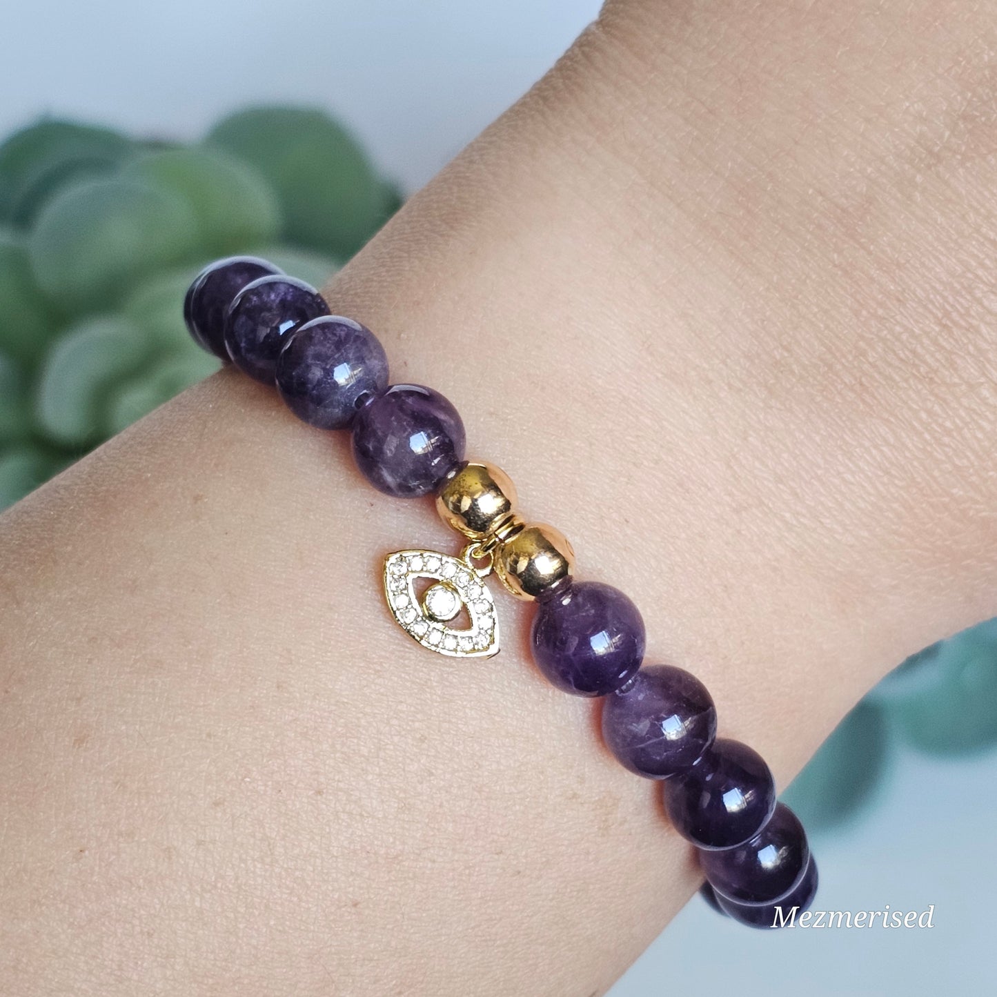 8mm Amethyst and gold plated Hematite bead stretch bracelet with your choice of charm.