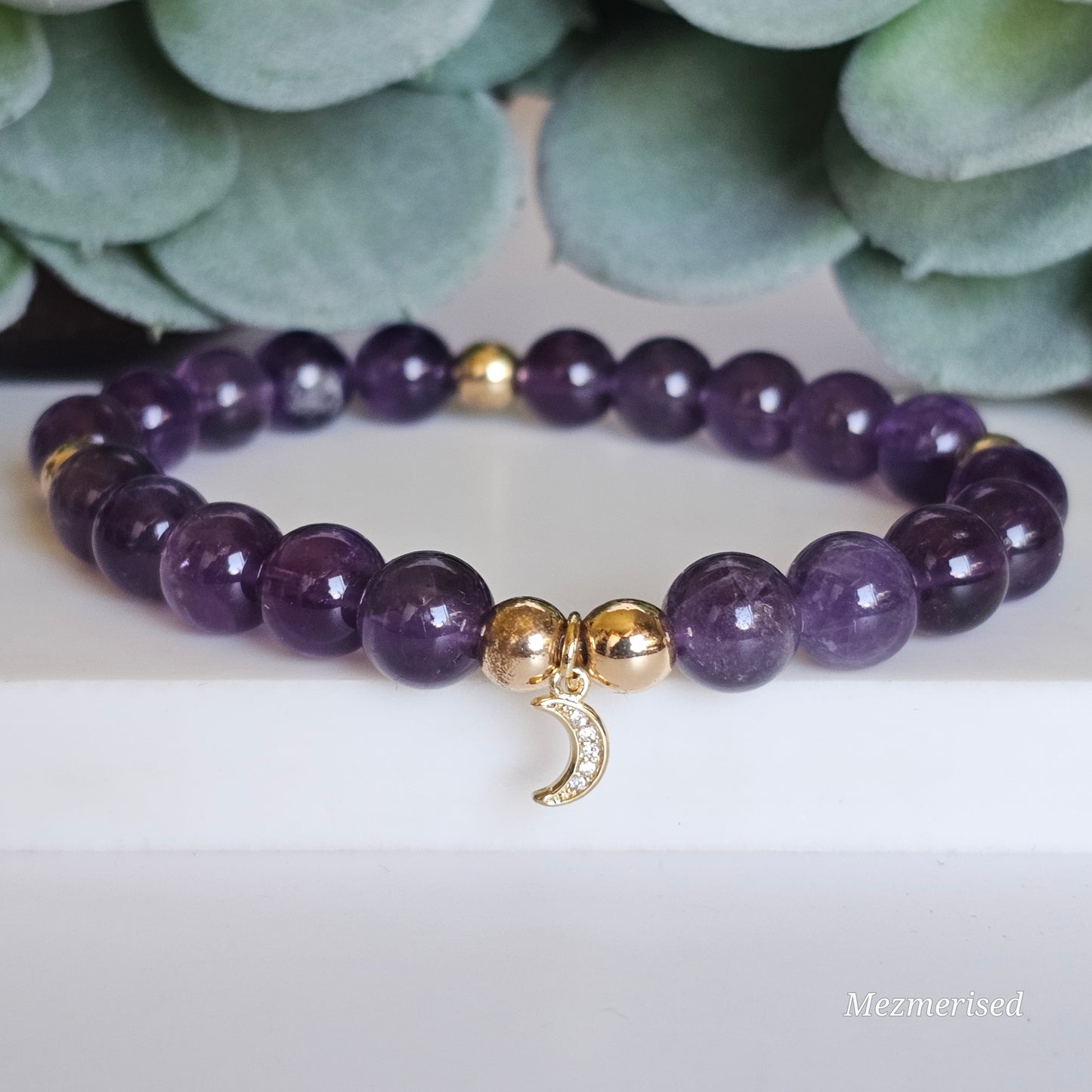 8mm Amethyst and gold plated Hematite bead stretch bracelet with your choice of charm.