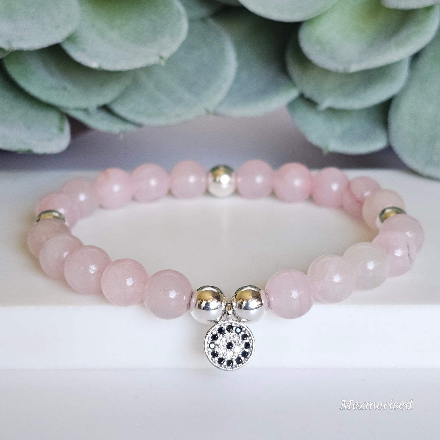 8mm Rose Quartz and silver plated Hematite bead stretch bracelet with your choice of charm.