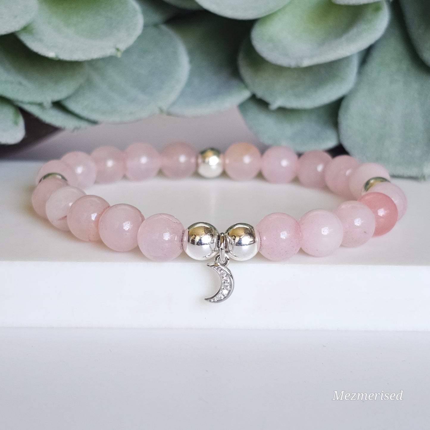 8mm Rose Quartz and silver plated Hematite bead stretch bracelet with your choice of charm.