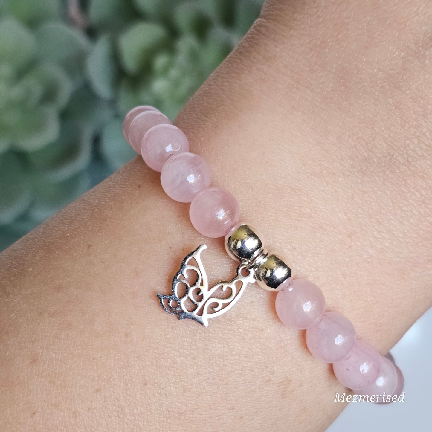 8mm Rose Quartz and silver plated Hematite bead stretch bracelet with your choice of charm.