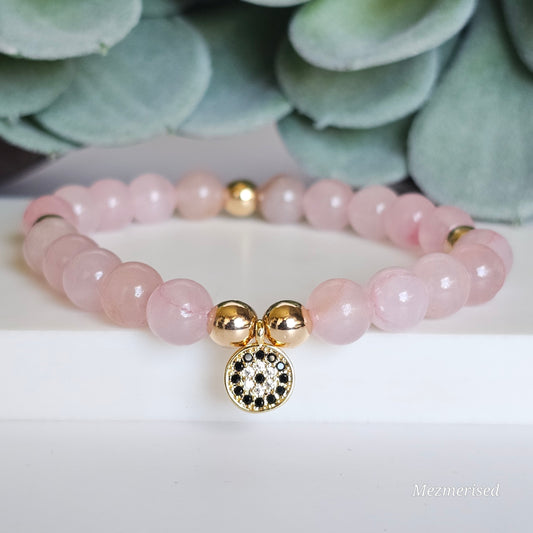 8mm Rose Quartz and gold plated Hematite bead stretch bracelet with your choice of charm.