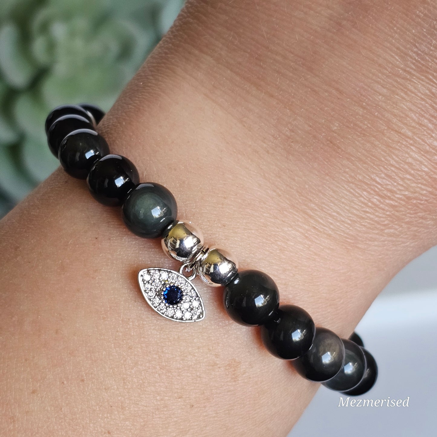 8mm AA grade Rainbow Obsidian and silver plated Hematite bead stretch bracelet with your choice of charm.