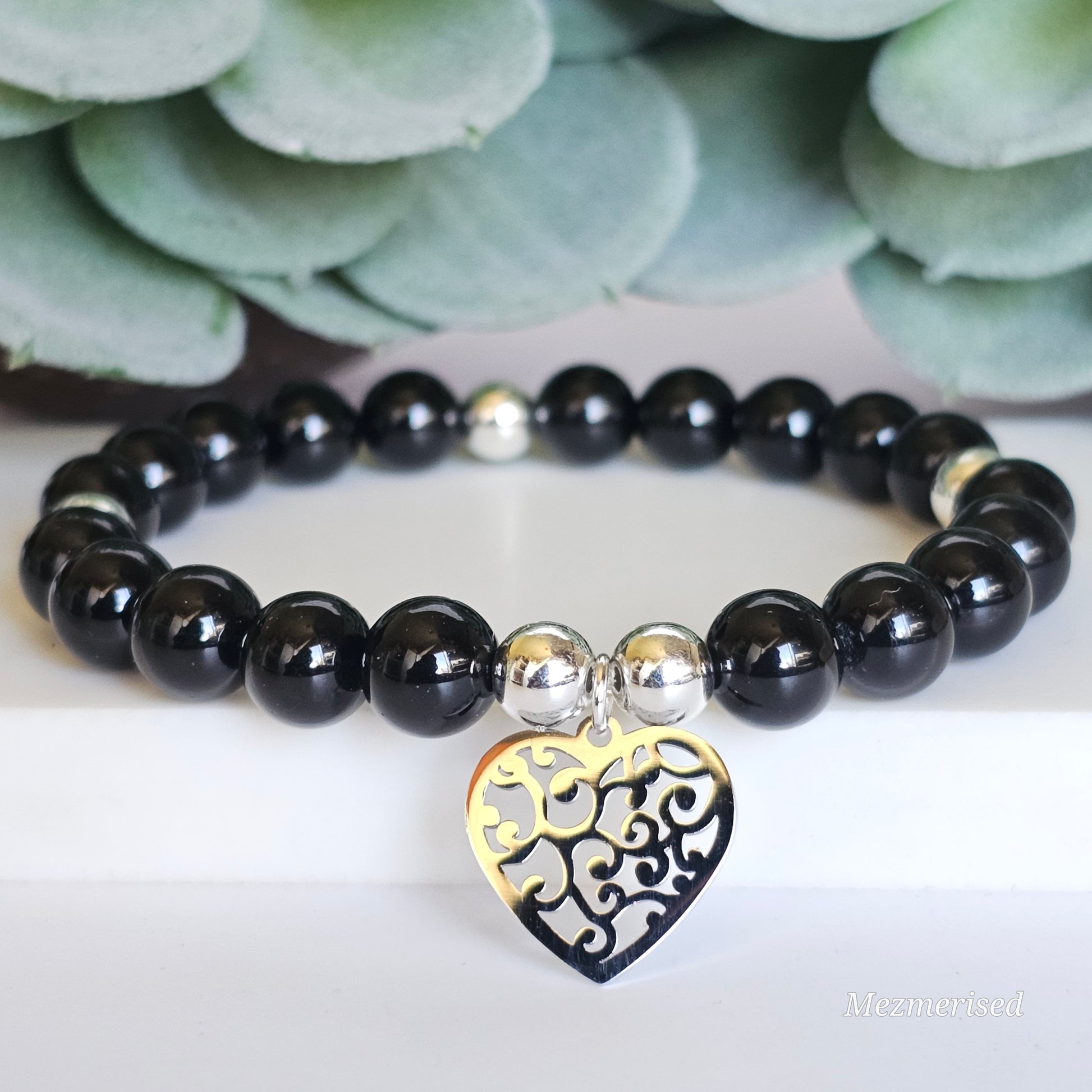 8mm A grade Black Tourmaline and silver plated Hematite bead stretch bracelet with your choice of charm.