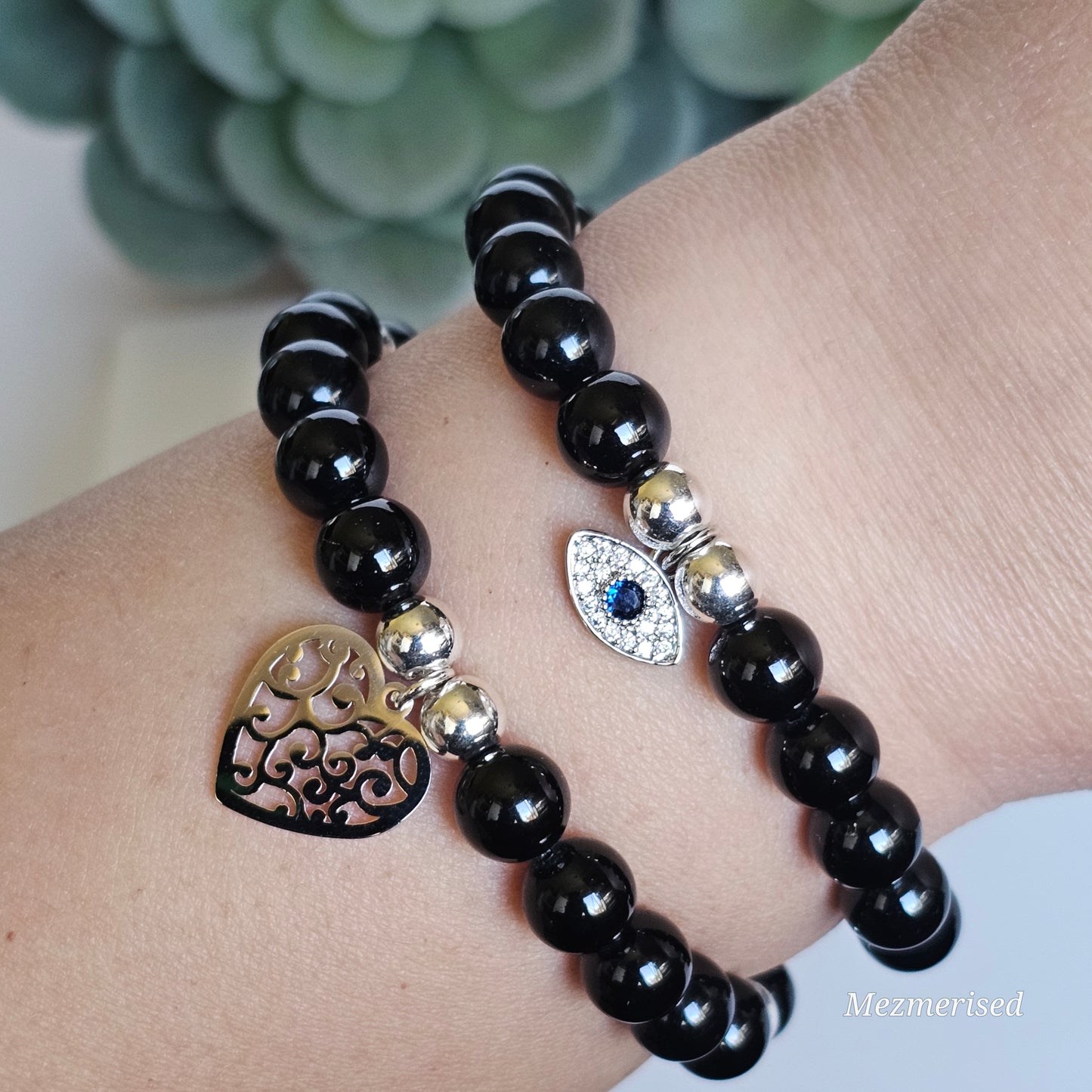 8mm A grade Black Tourmaline and silver plated Hematite bead stretch bracelet with your choice of charm.