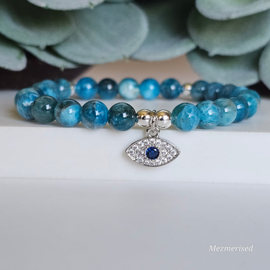 6mm A grade blue Apatite and silver plated Hematite bead stretch bracelet with your choice of charm.