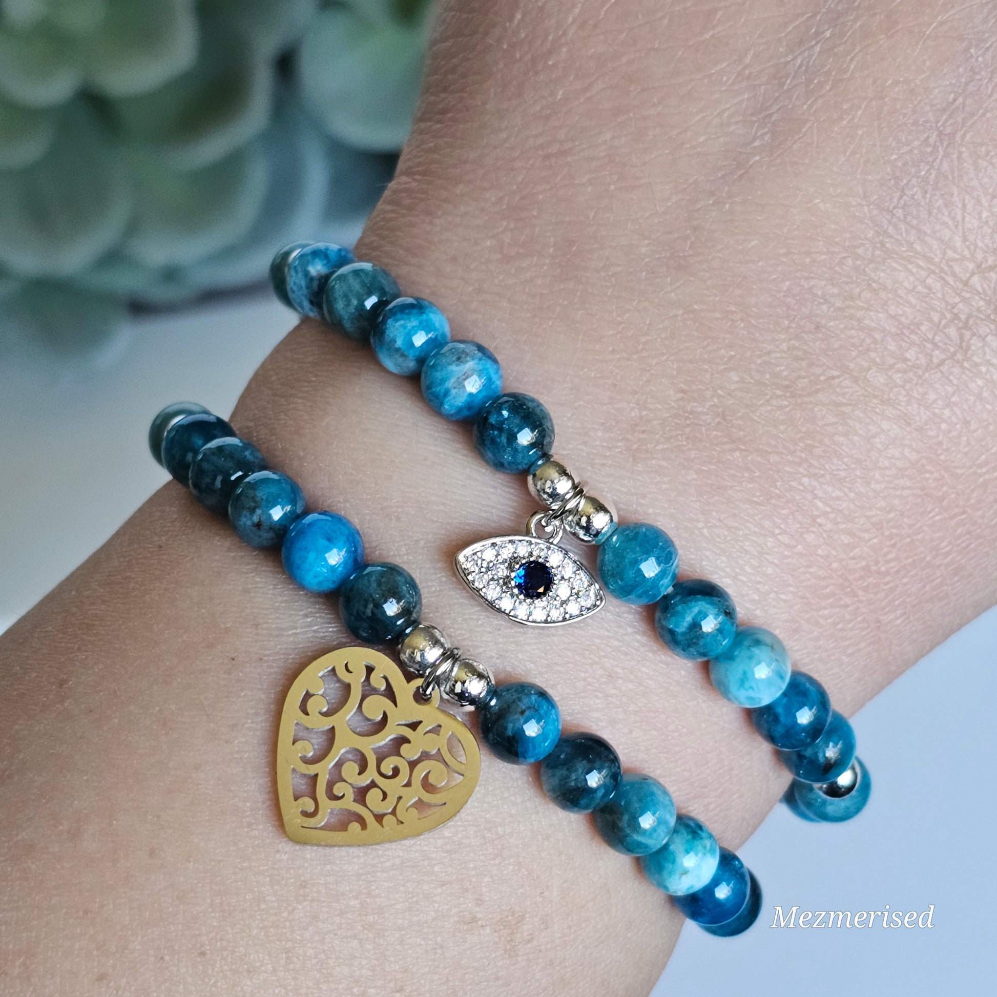 6mm A grade blue Apatite and silver plated Hematite bead stretch bracelet with your choice of charm.