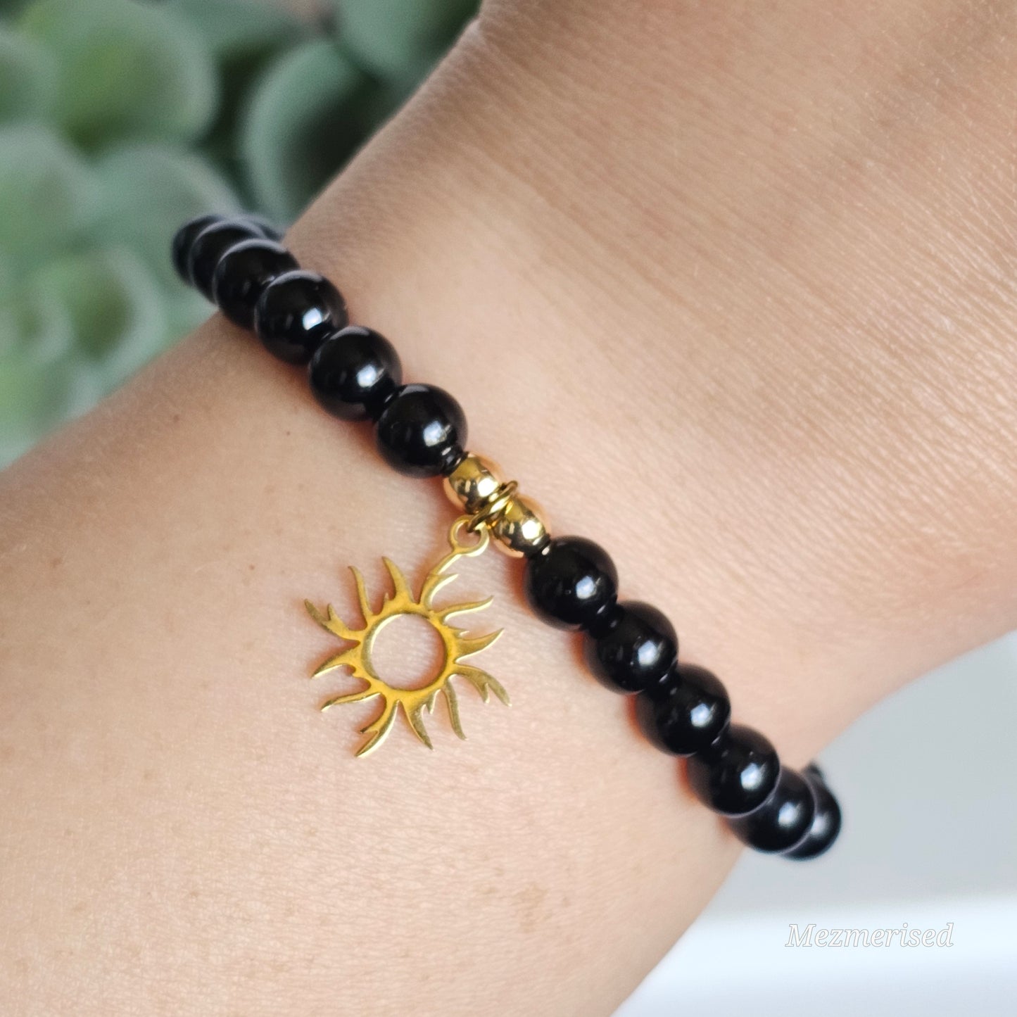 6mm A grade Black Tourmaline and gold plated Hematite bead stretch bracelet with your choice of charm.