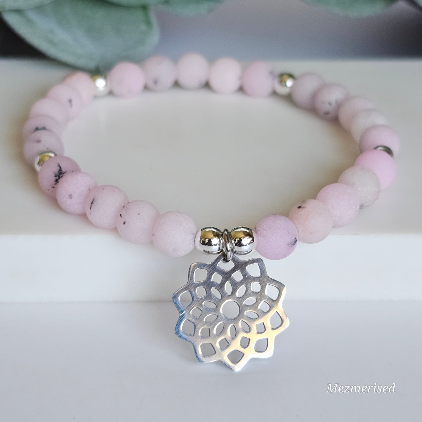 6mm matte Plum Blossom Jasper and silver plated Hematite bead stretch bracelet with your choice of charm.