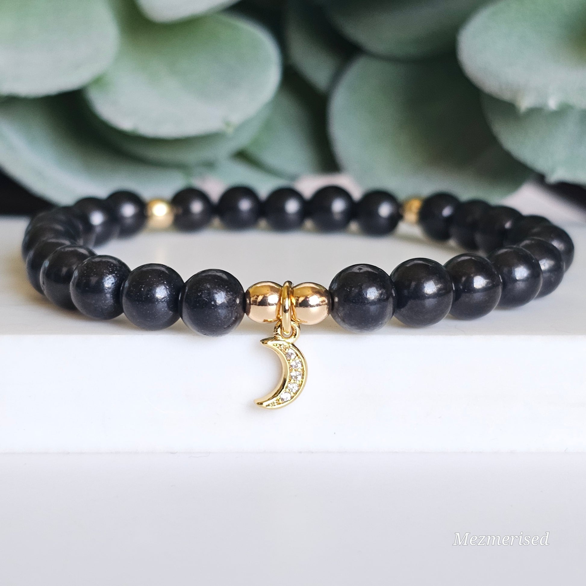 6mm Shungite and gold plated Hematite bead stretch bracelet with your choice of charm.