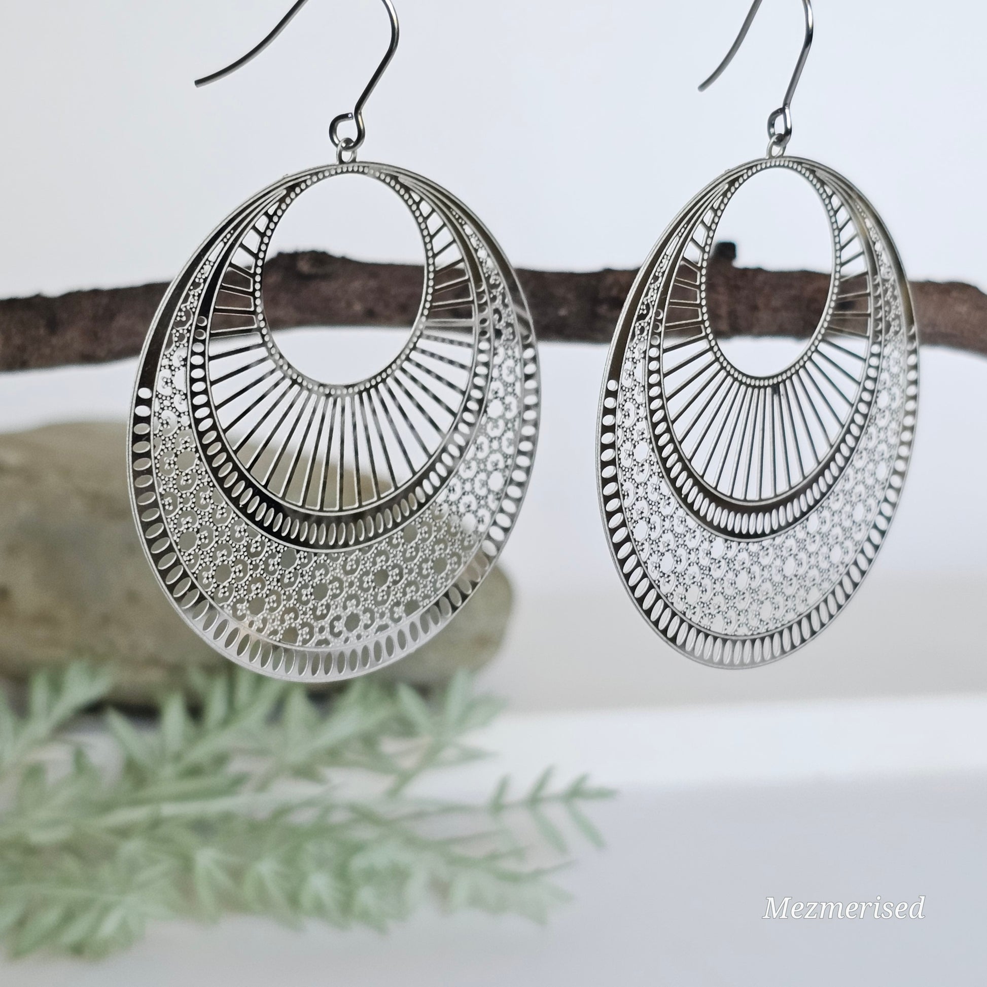 Large round filigree silver earrings