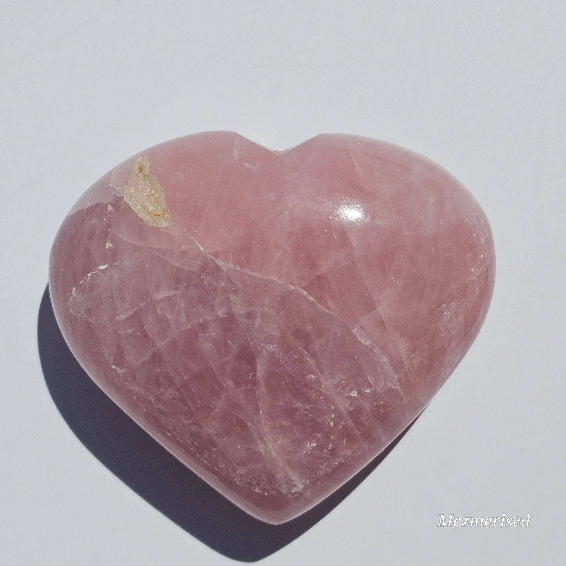 Beautifully carved puffy Rose Quartz heart with Calcite.