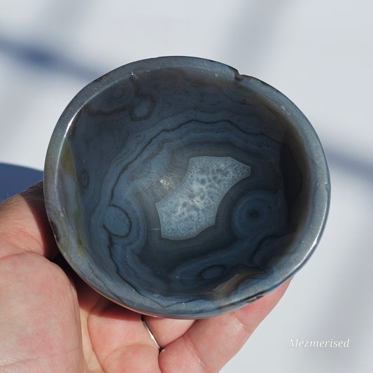 An eccentric Agate bowl with beautiful banding and Quartz.