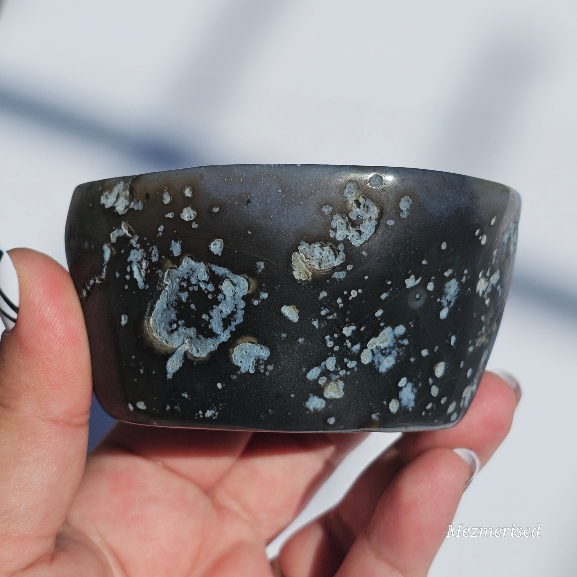 An eccentric Agate bowl with beautiful banding and Quartz.