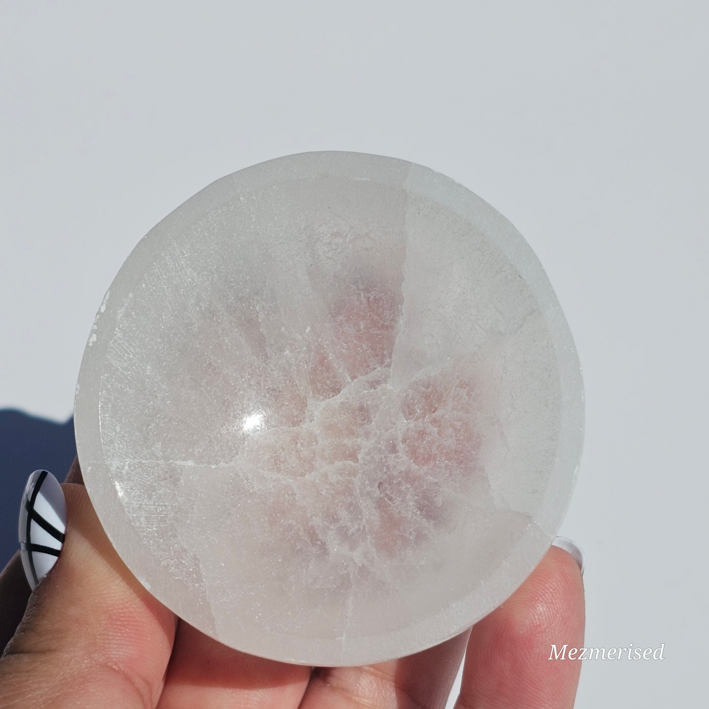 A small Selenite round dish perfect for cleansing your mini crystals.