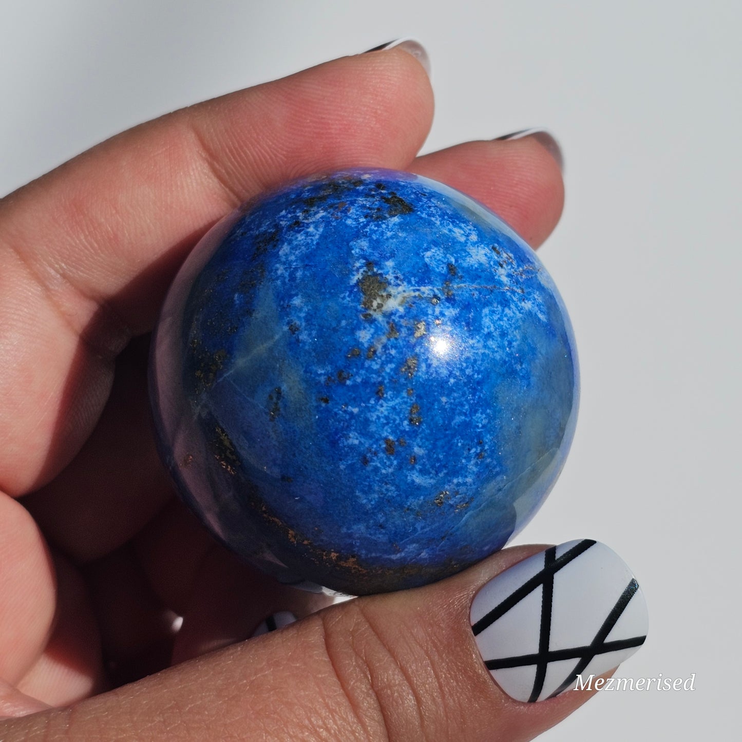 A beautiful quality Lapis Lazuli sphere