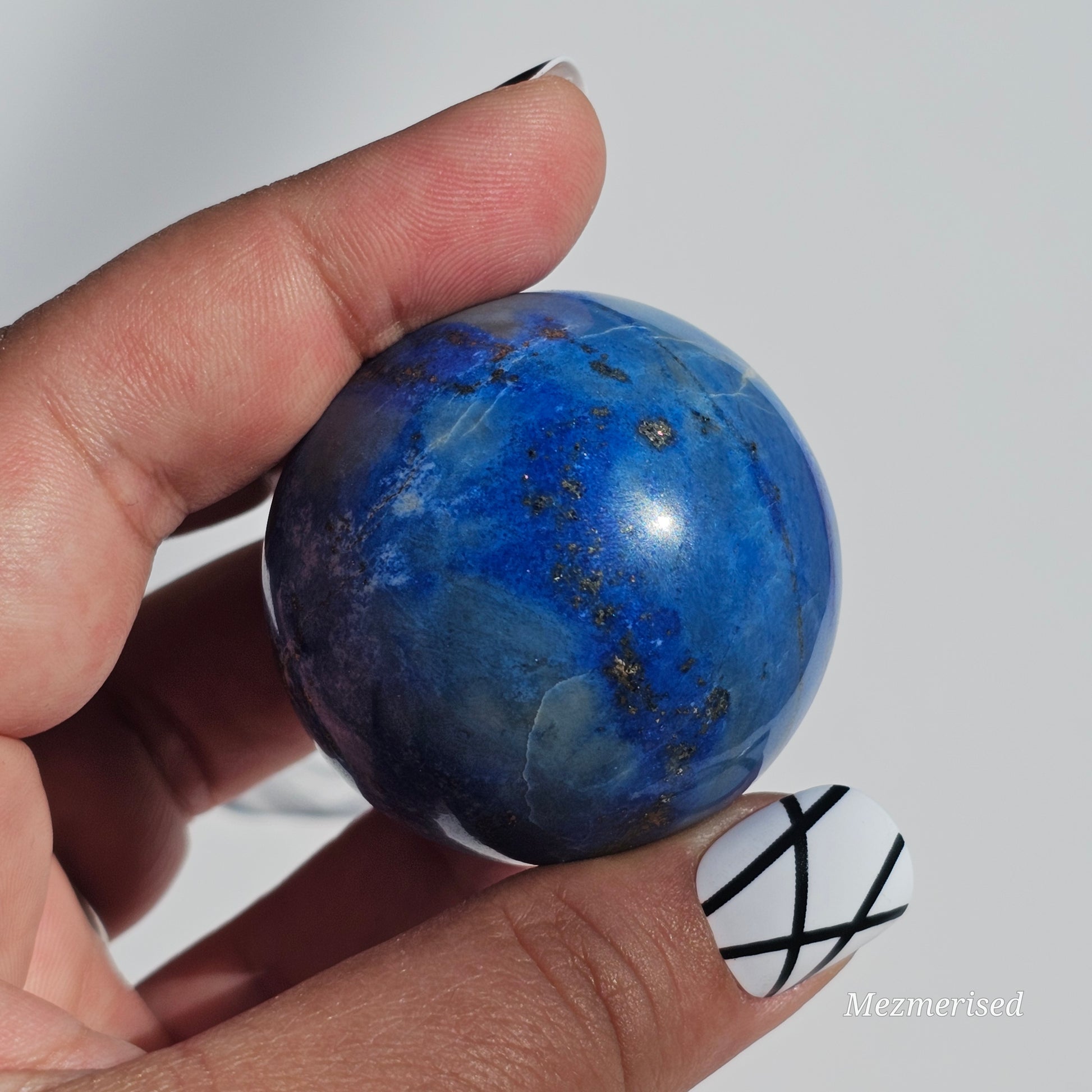 A beautiful quality Lapis Lazuli sphere