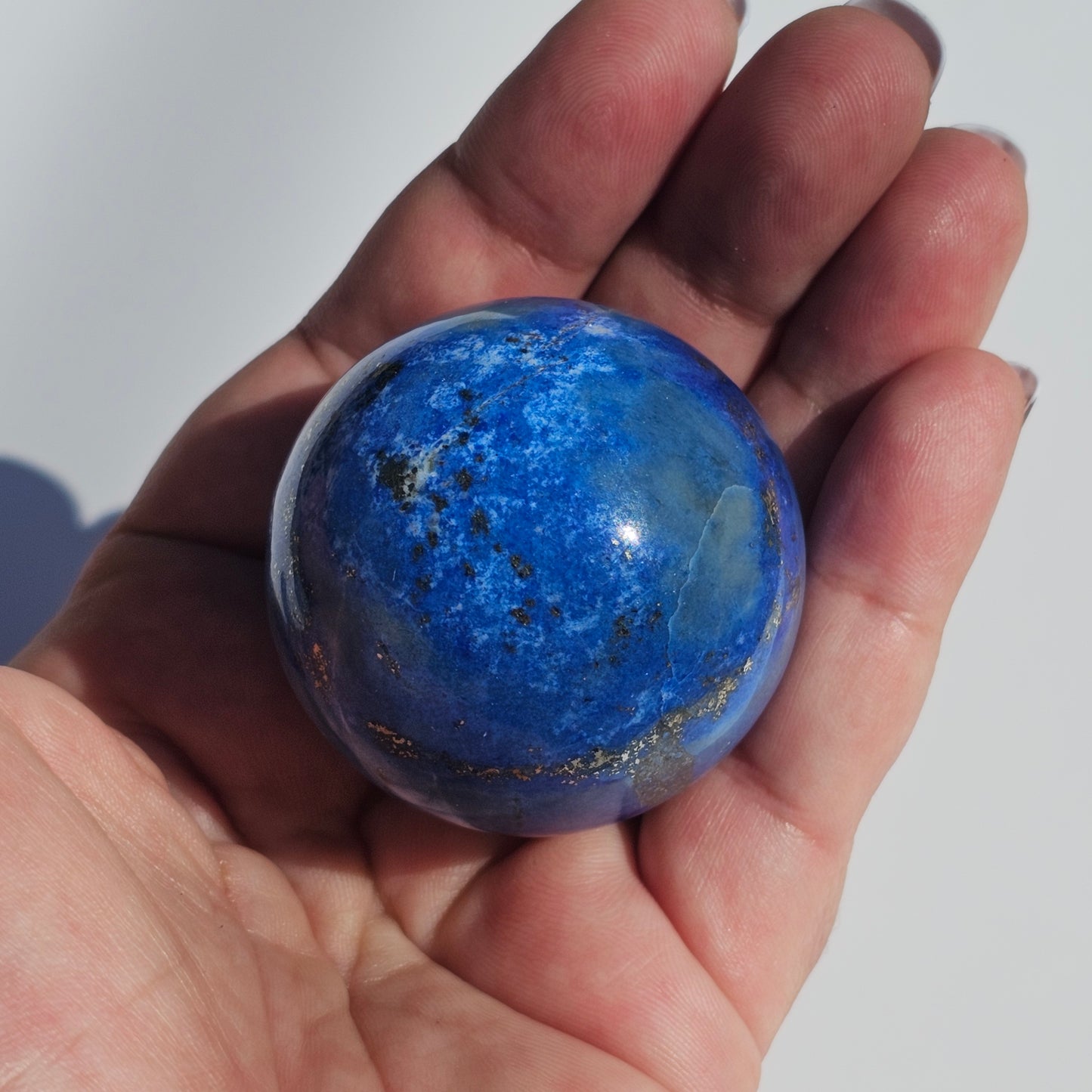 A beautiful quality Lapis Lazuli sphere