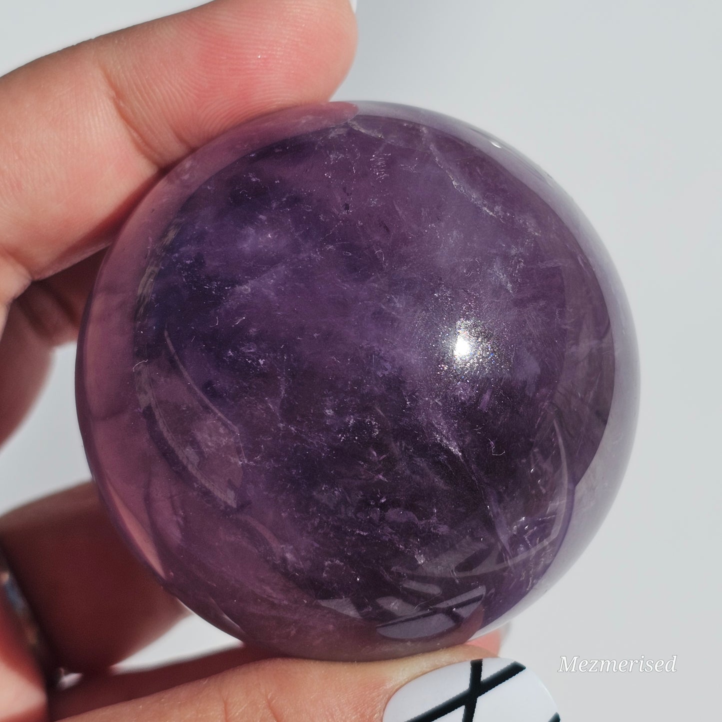 A calming rich purple Amethyst sphere.