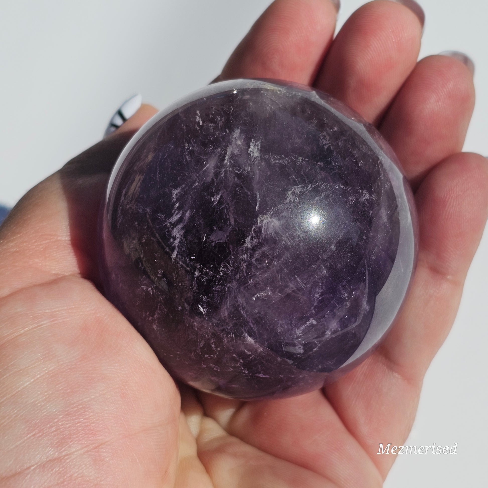 A calming rich purple Amethyst sphere.