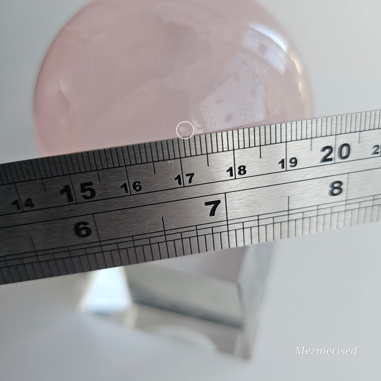 A beautiful Rose Quartz sphere with flash and gorgeous rainbows