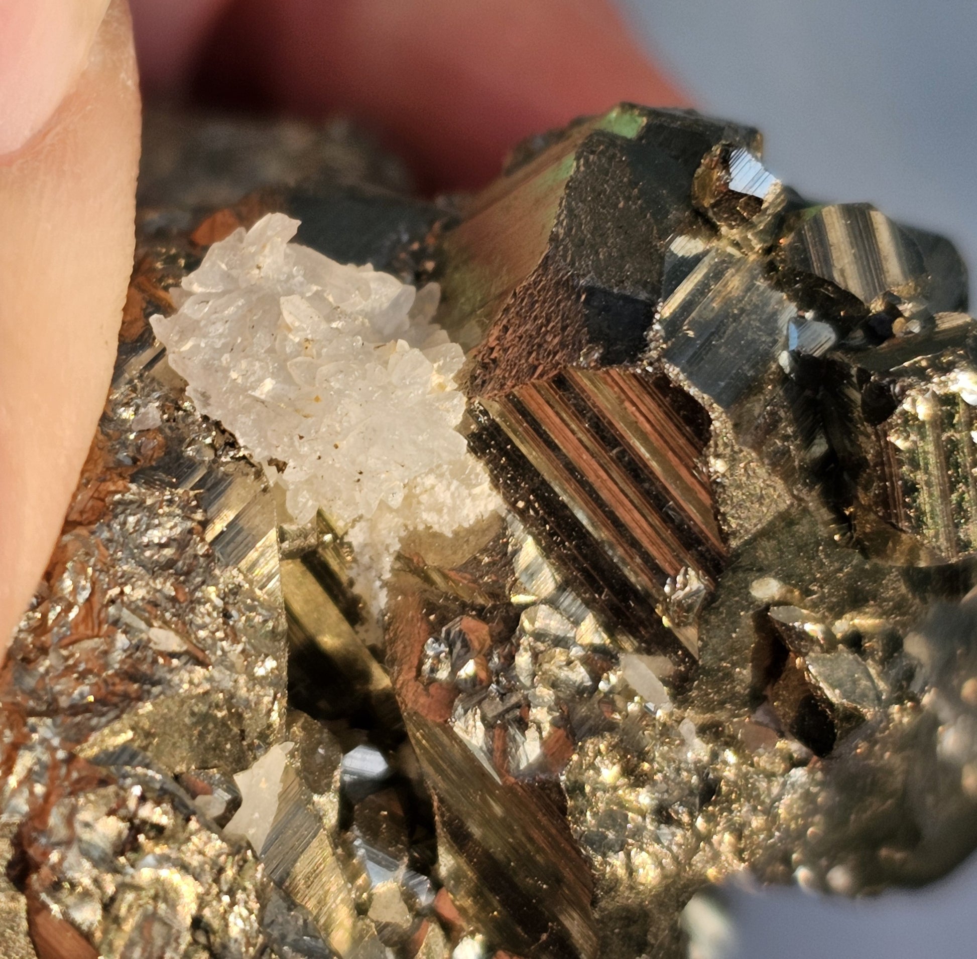 Natural Pyrite cluster in its raw form. This mineral displays a brilliant metallic lustre, with well-defined and sharp parallel striations.