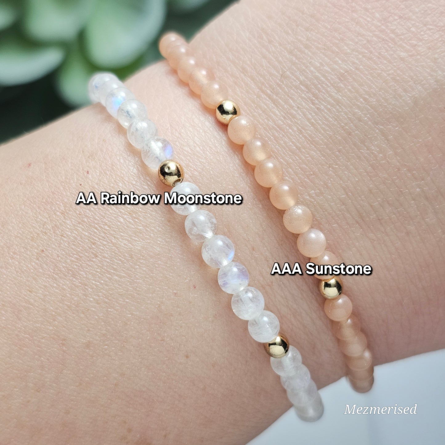Stacked 4mm AA Grade Rainbow Moonstone and AAA Grade Sunstone gemstone bracelets with minimalist gold accent details.
