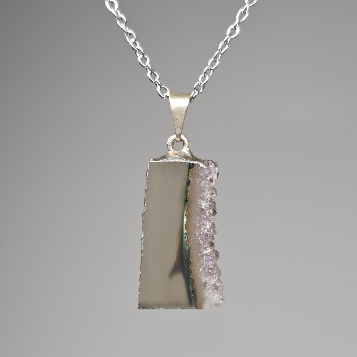 Amethyst Stalactite Slice Pendant hanging on a 45cm stainless steel chain